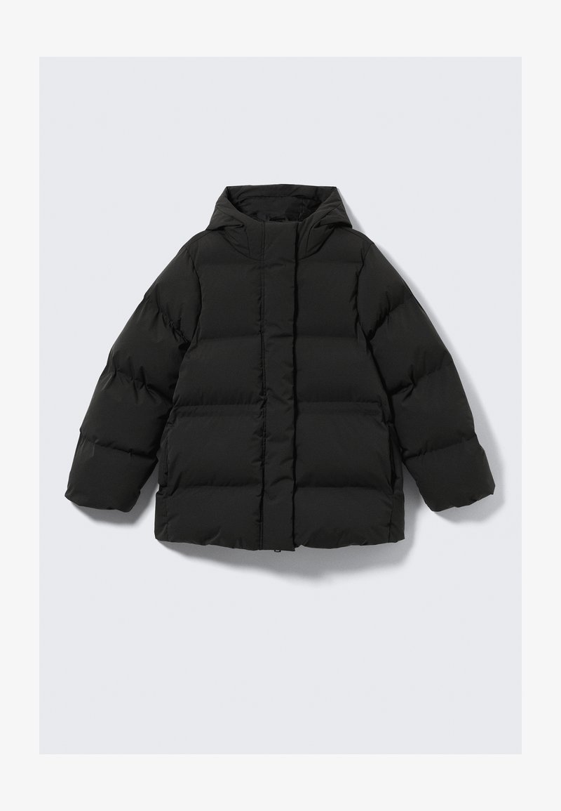 Black padded puffer jacket with a hood, featuring a boxy shape, quilted design, and front zipper closure. Textured fabric with horizontal stripes.