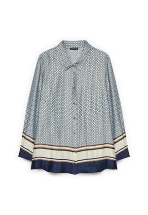 Camicia azzurro chiaro a maniche lunghe con piccolo motivo geometrico, bordo beige con pois e righe, polsini e orlo blu scuro.