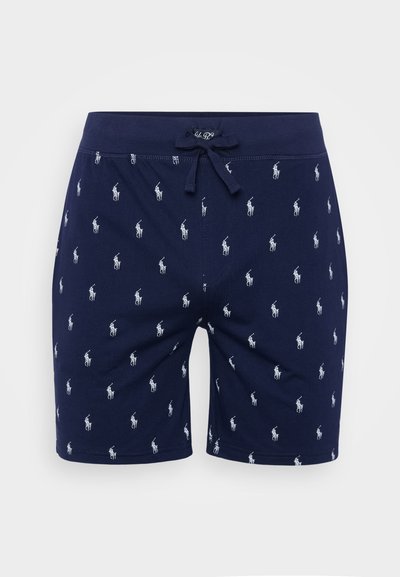 Navy blue shorts made of cotton with a drawstring waist. Features repeated white polo player pattern across the fabric.