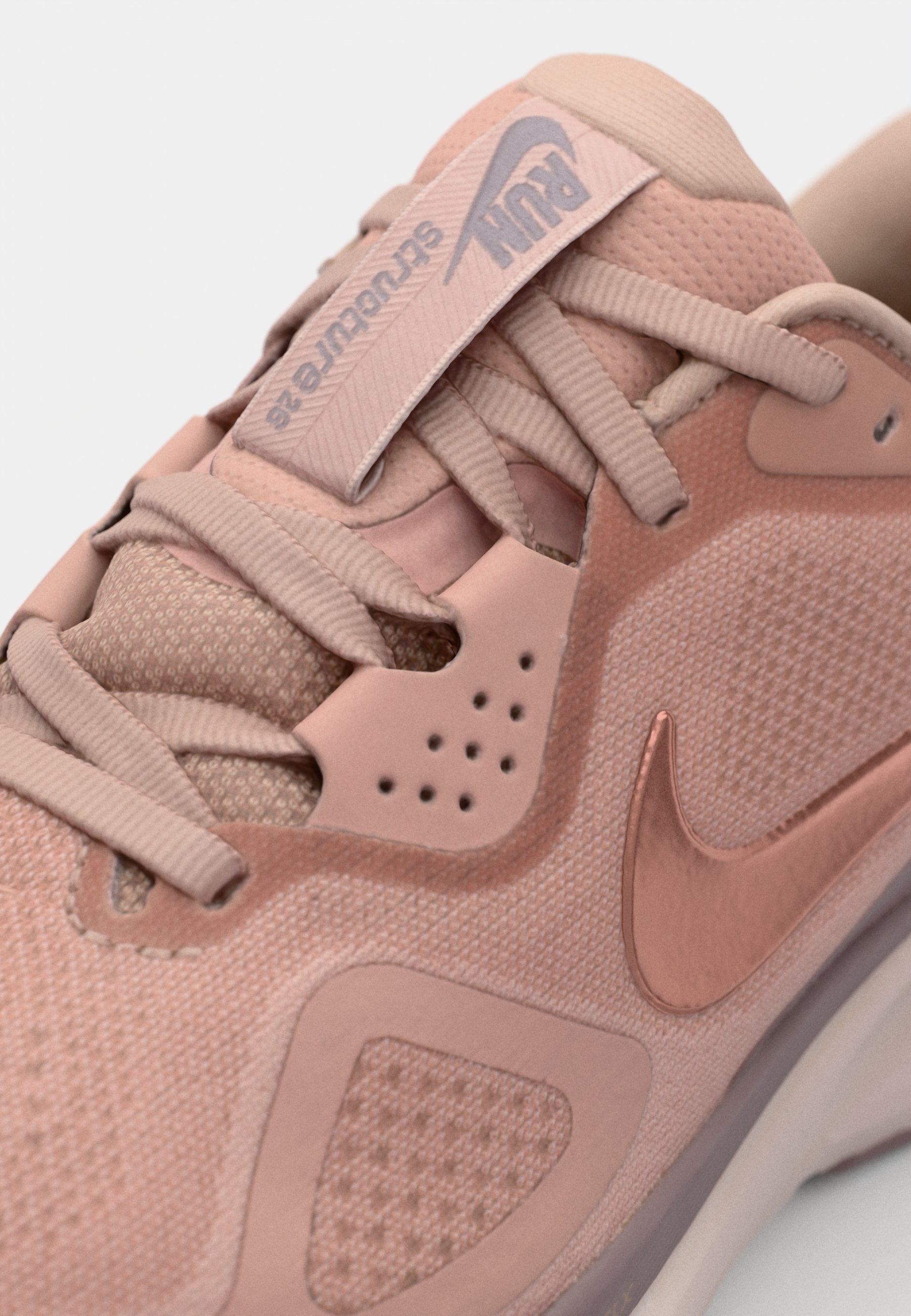 peach colored nike running shoes
