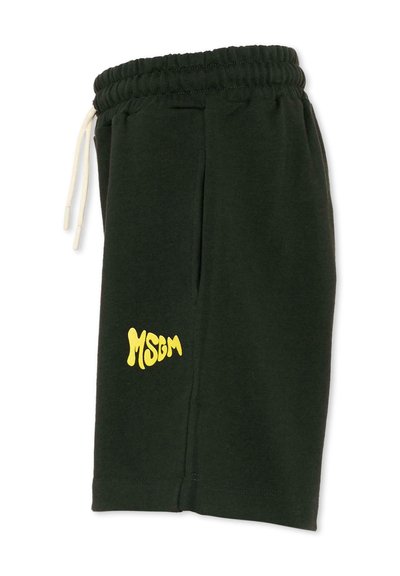 Shorts noirs à taille élastique avec cordons blancs et logo jaune "MSGM" sur la cuisse gauche, présentés à plat.