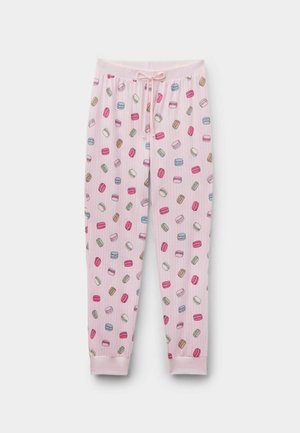 Roze pyjamabroek met een elastische tailleband en trekkoord, voorzien van een herhalend patroon van kleurrijke macarons. Geribbelde boorden bij de enkels.