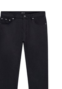 Jeans in denim neri con un design aderente, dotati di cinque tasche, hardware argentato e dettagli di cucitura sottili lungo le cuciture.
