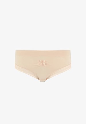 Culotte basse couleur pêche en tissu doux, avec un détail en nœud à l'avant et des bords festonnés le long de la taille.