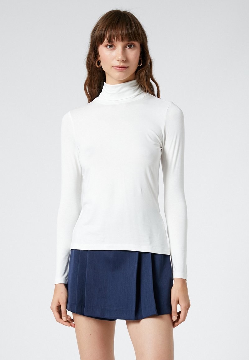 Buy Koton Solid Turtle Neck Sweater In Grey | 6thStreet Oman