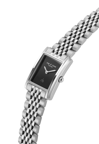 Söljfärgad rostfri stålarmbandsklocka med en rektangulär svart urtavla, kontrasterande visare och länkarmband. Varumärkeslogotypen visas.