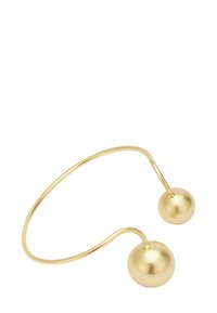 Zlatý kovový náramok s dvoma hladkými guľatými akcentmi na oboch koncoch. Dizajn má minimalistický, zakrivený tvar.
