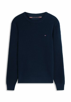 Marineblauer, gerippter Strickpullover mit Rundhalsausschnitt, langen Ärmeln und kleinem roten, weißen und blauen Tommy Hilfiger-Logo auf der Brust.