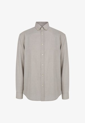 Koszula z długim rękawem w jasnobeżowym kolorze, z kołnierzykiem zapinanym na guziki, guzikami z przodu i zaokrąglonym dołem. Gładka tekstura, brak wzorów.