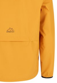 Žltá nepremokavá bunda s dlhými rukávmi, obsahujúca prednú vrecko a čierny elastický manžet. Logo v tmavo fialovej farbe na oblasti hrude.