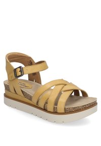 Damskie sandały, żółta skórzana cholewka, dwa regulowane paski z klamrą, korkowa wkładka, biała platforma, krzyżowy wzór.