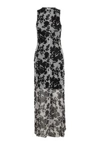 Rochie lungă, fără mâneci, în alb și negru, cu un model punctat. Fabricată dintr-un material ușor, având o siluetă dreaptă și lungime până la jumătatea gambei.