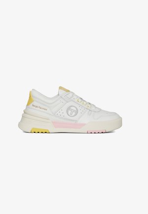 White leather sneaker with yellow and pink accents, textured back, perforated detailing, and round logo on the side. Chunky sole design.