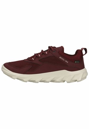 Burgundy athletic shoe with mesh and synthetic upper, white cushioning sole, lace-up closure, and rear pull tab. Modern design with textured accents.