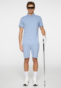 J.LINDEBERG Sports TOUR - Pikeepaita - rain washed