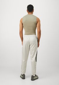 adidas Sportswear TIRO  szary