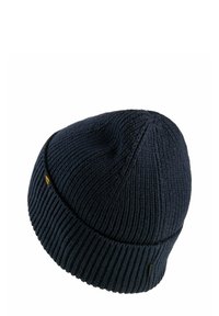 Navyblauwe gebreide beanie met verticale strepen, geribbelde boord en een klein merkaccent aan de zijkant. Zachte, gevtextureerde stof.