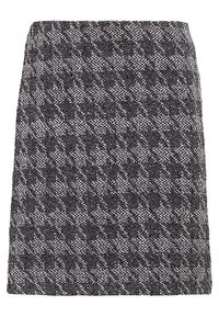 Mustat ja valkoiset tweed-minihameet, joissa on geometrinen kuvio, suora leikkaus ja teksturoitu kangaspinta. Ei näkyviä metalliosia.
