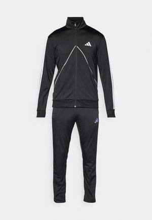 Black tracksuit made of smooth fabric, featuring a zip-up jacket with white accents and logo, paired with matching pants.