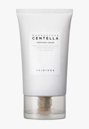 Tube blanc de crème apaisante Skin1004 Madagascar Centella, 75 ml, avec un capuchon transparent à clapet en bas.