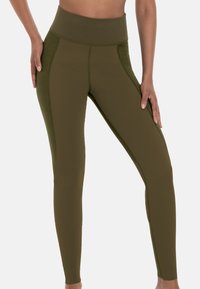 Hoge taille olijfgroene leggings met een gladde textuur, voorzien van meshpanelen aan de zijkanten en platte naden voor comfort en rekbaarheid.