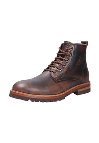 Bottines en cuir marron avec un bout rond, un laçage sur l'avant et une semelle en caoutchouc épaisse avec un motif de bande de roulement. Détails Cousus sur le côté.