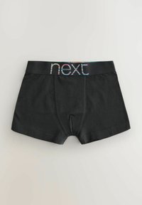 Crne pamučne bokserice s elastičnom trakom koja ima šareni "next" logo. Glatka tekstura s krojem srednje dužine.