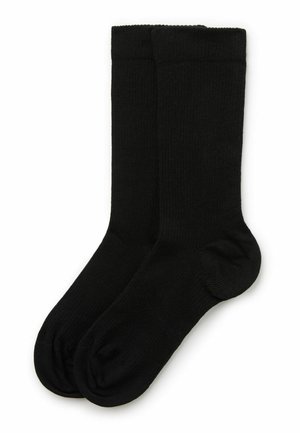 Paar schlichte schwarze Socken in Knöchellänge aus Rippstrickstoff, nebeneinander auf weißem Hintergrund gezeigt.