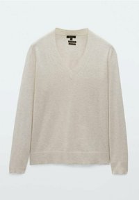 Beige, long-sleeve V-neck sweater made of soft material with a ribbed hem. Features a simple, smooth texture with no visible patterns.