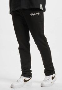 DIRTYPIGS - Tracksuit bottoms - black Thumbnail Image 1