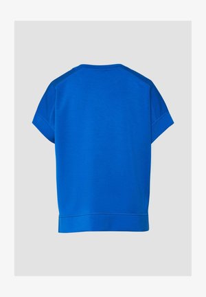 Blue short-sleeve t-shirt with crew neck, visible stitching details, and wide hem, shown from the back on a light gray background.