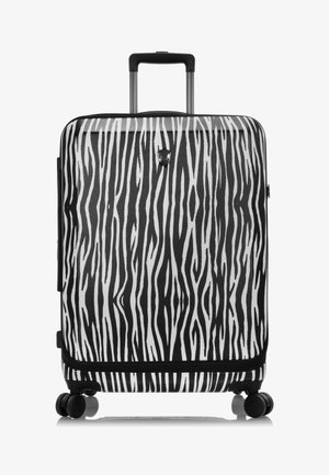 Hartschalenkoffer mit Zebra-Muster in Schwarz-Weiß, ausziehbarem Griff, vier Rollen und Reißverschluss. Glatte Oberfläche.