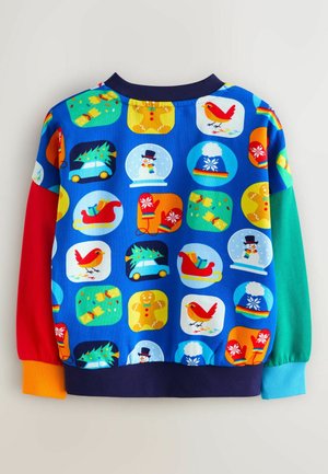 Színes gyerek pulóver kék alapon, játékos, ünnepi témájú mintákkal körökben. Többszínű ujjakkal és bordázott mandzsettákkal.