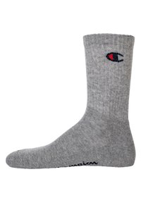 Gray cotton sock with ribbed texture, featuring a logo in blue and red. The design includes a reinforced toe and heel for durability.