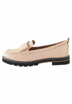 Light pink leather loafers with a rounded toe, brown accent bow, and a textured black rubber sole. Stitching detail along the edges.