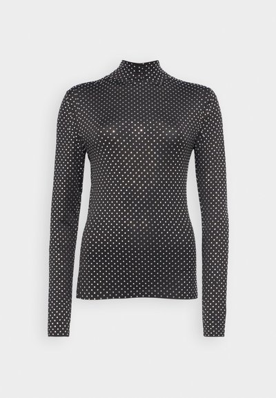 Μαύρο μακρυμάνικο τοπ με γιακά τύπου τυλιχτού και σχέδιο από κουκίδες σε λευκό χρώμα, φτιαγμένο από ομαλό, ελαστικό υλικό. Στενή εφαρμογή.