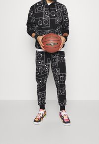 Puma Träningsbyxor - black