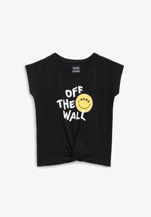 Maglietta di cotone nera con maniche corte, con una faccina gialla sorridente e testo bianco con la scritta "OFF THE WALL" in un design annodato sul davanti.