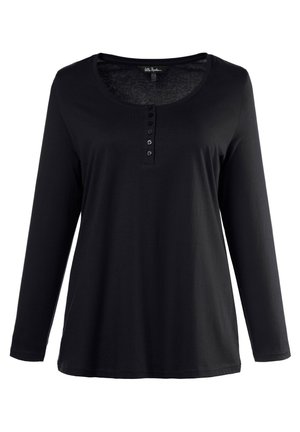 Camicia nera a maniche lunghe in tessuto morbido con scollo rotondo e pattina con quattro bottoni sul davanti.