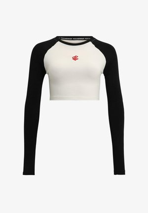 Fekete-fehér, rövidített, hosszú ujjú felső, fehér testtel, fekete ujjakkal és piros logóval a mellkasán. Puha pamut anyag.