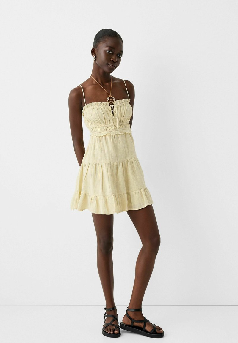 Bershka Jurk beige mêleerd