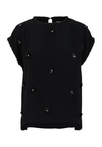 Top negro de manga corta con tejido texturizado, escote con volantes y embellishments florales negros con lentejuelas. Cierre en forma de lágrima en la parte posterior.