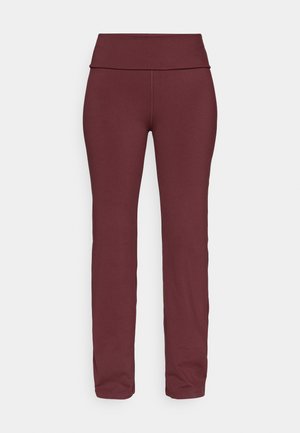 Burgundy leggings featuring a wide, folded waistband, tapering legs, and a smooth, stretchy fabric suitable for activewear.