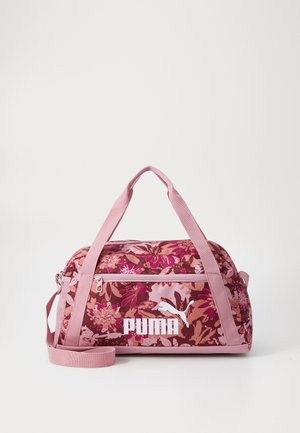 Bloemmotief sporttas in tinten roze en bordeauxrood. Heeft dubbele handvaten, een afneembare schouderband en een opvallend wit logo.