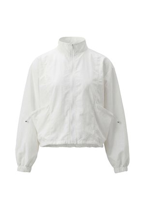 Giacca bianca leggera con zip frontale, collo alto, polsini elastici e due tasche frontali con coulisse regolabili.