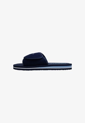 Navy blue slide sandal with a textured upper and a padded strap, featuring a contrasting light blue midsole and a patterned footbed.