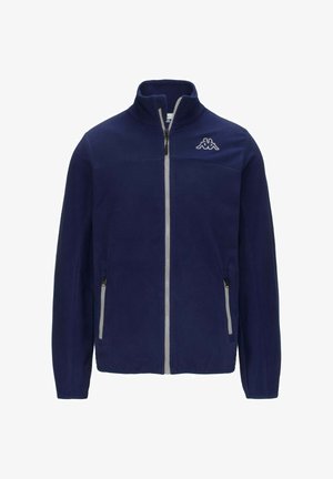 Giacca in pile blu navy con zip frontale, colletto rialzato e logo Kappa. Presenta due tasche laterali con cerniere grigie e una texture morbida.
