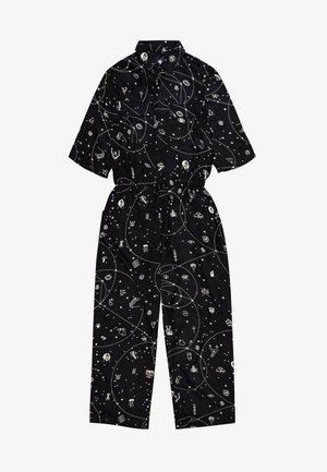 Black jumpsuit with short sleeves, featuring white space-themed illustrations and circular patterns. Includes an elastic waist and two pockets.