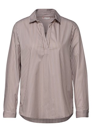 Blouse taupe à manches longues avec rayures verticales blanches, col et patte de boutonnage en V, avec poignets boutonnés et ourlet arrondi.