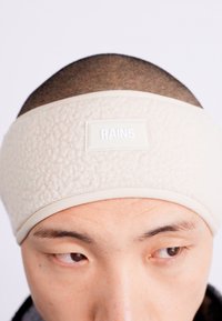 Rains HEADBAND UNISEX - Ausu sildītāji - dune
